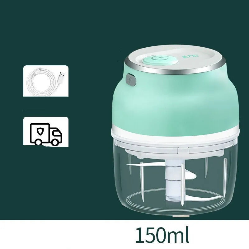 Portable USB electric food chopper with transparent cup and stainless steel blade.