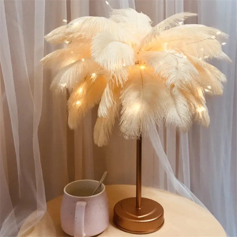 Remote control feather table lamp with warm white light, iron shell, pink feather style on bedside table
