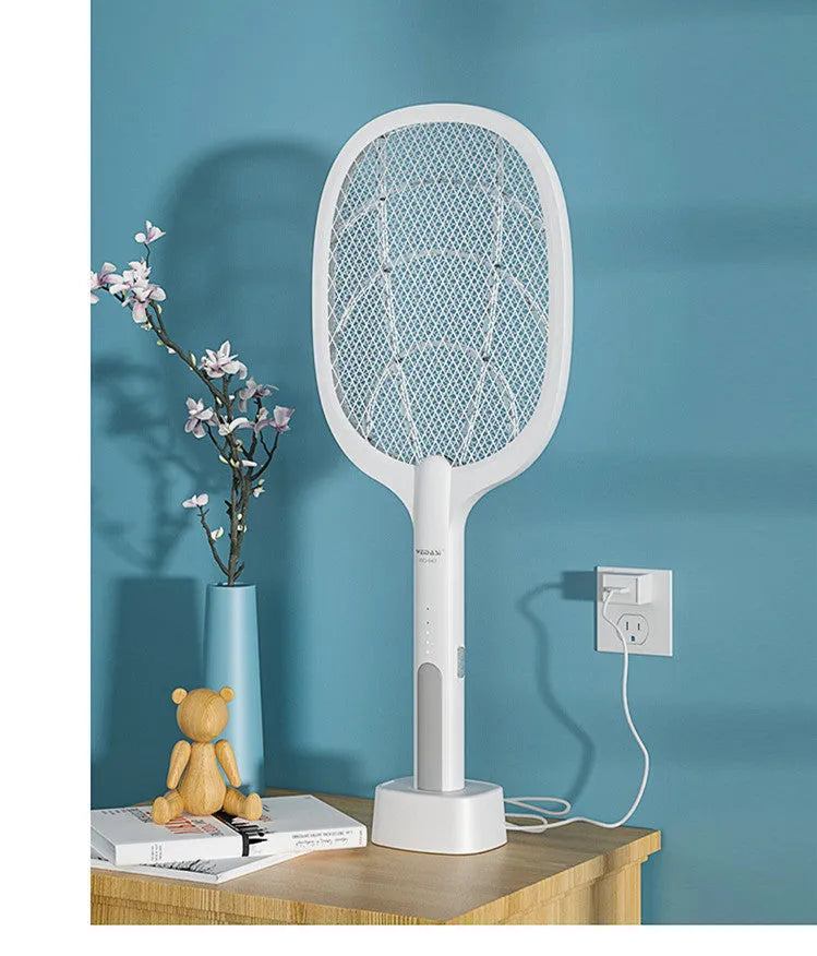 Rechargeable electric mosquito swatter with metal grid, USB charging cable, and charger base.