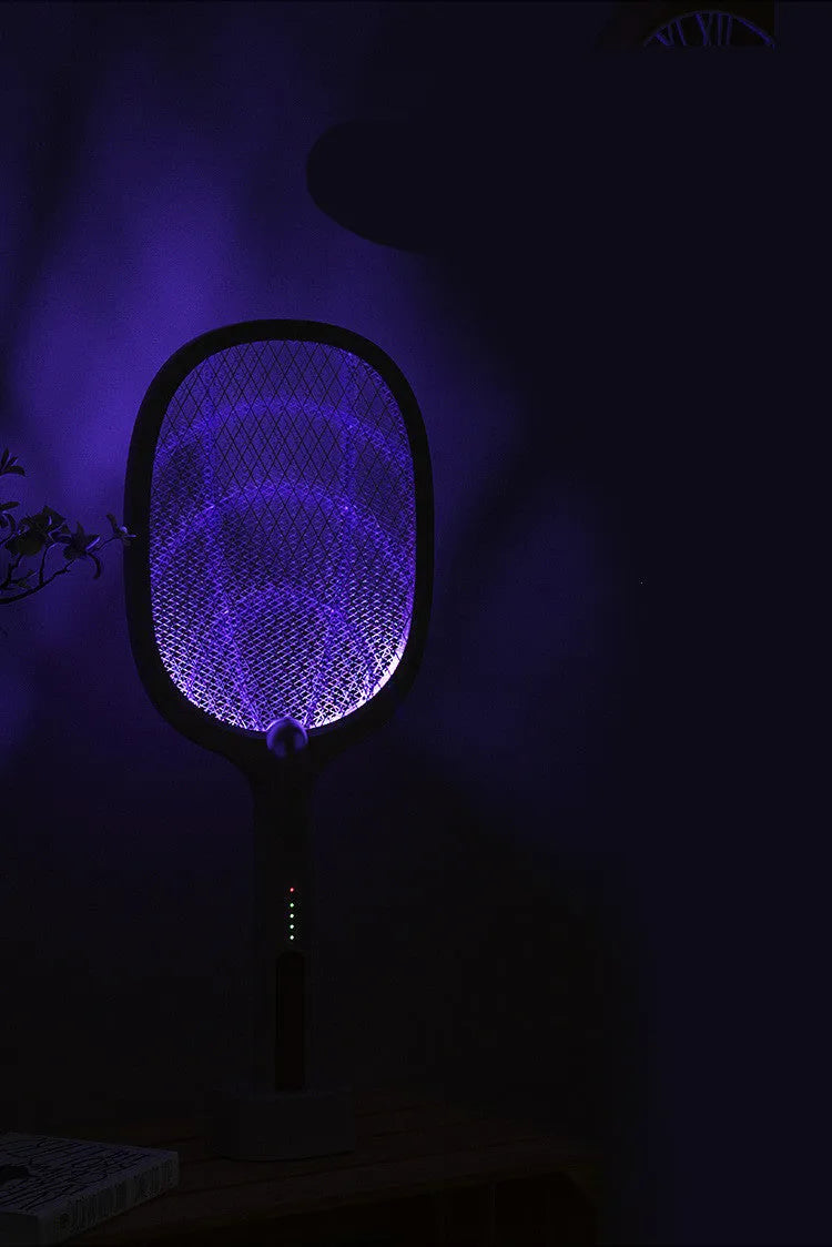 Rechargeable electric mosquito swatter with metal grid, USB charging cable, and charger base.