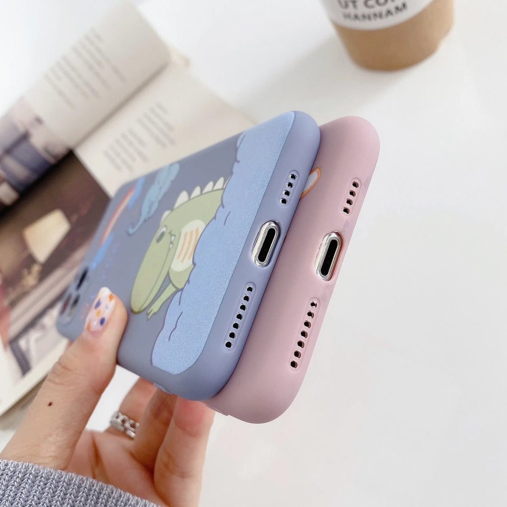 Blue cartoon dinosaur design TPU iPhone case showing frosted finish and precise cutouts