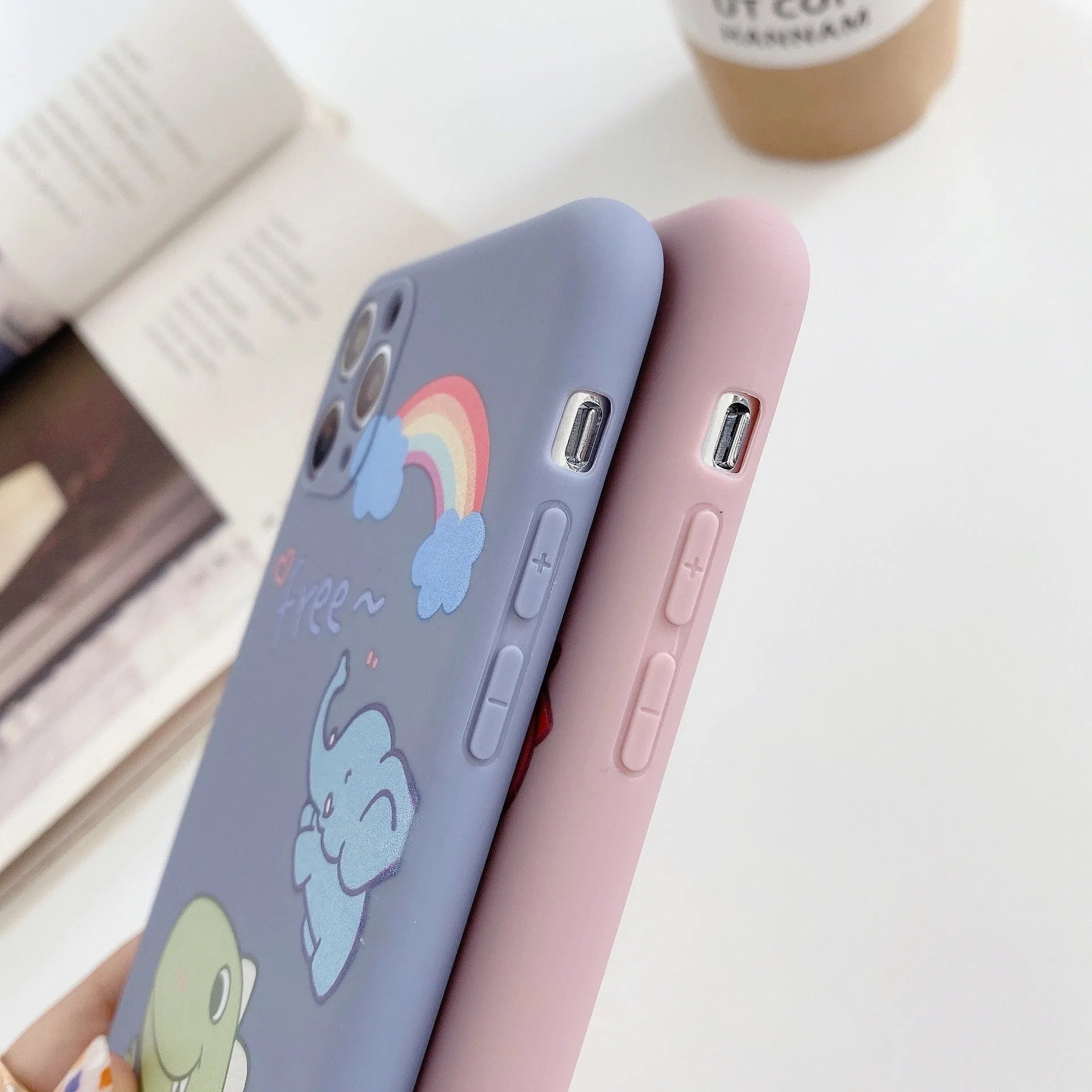 Blue cartoon dinosaur design TPU iPhone case showing frosted finish and precise cutouts