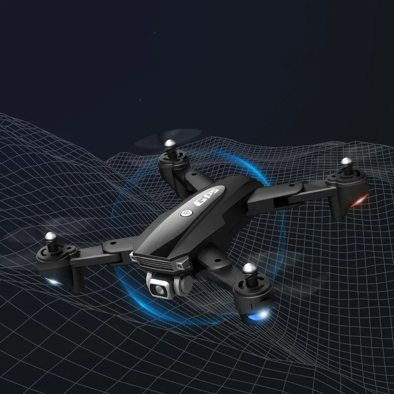 Black folding quadcopter drone with 4K camera and remote control handle for children