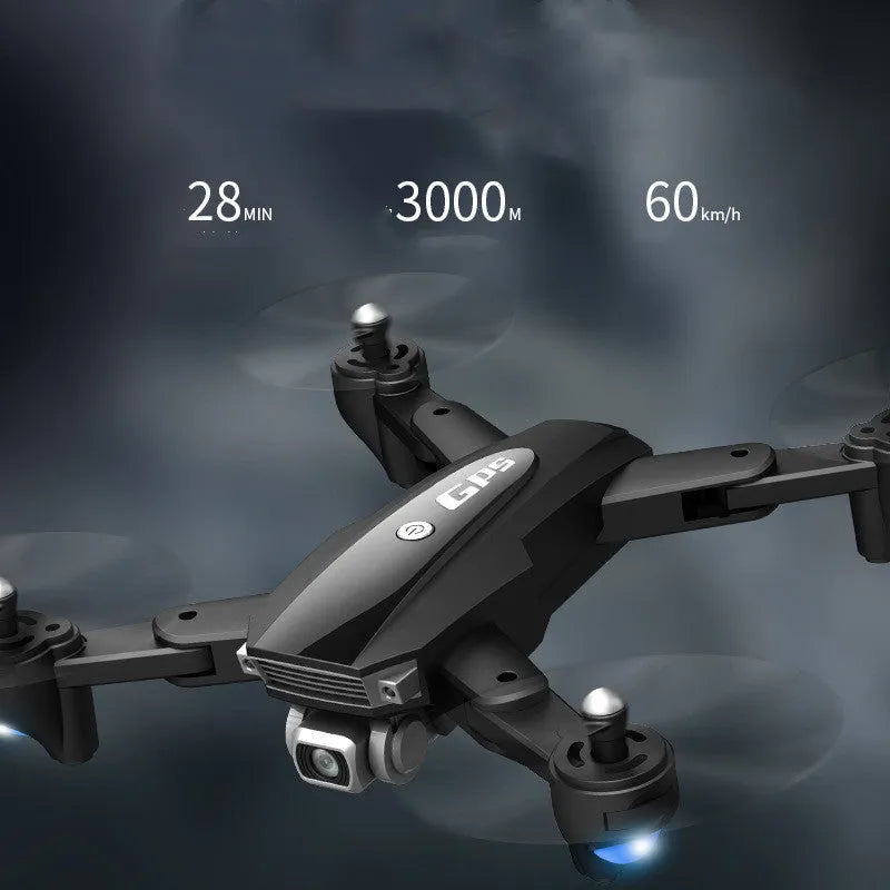 Black folding quadcopter drone with 4K camera and remote control handle for children
