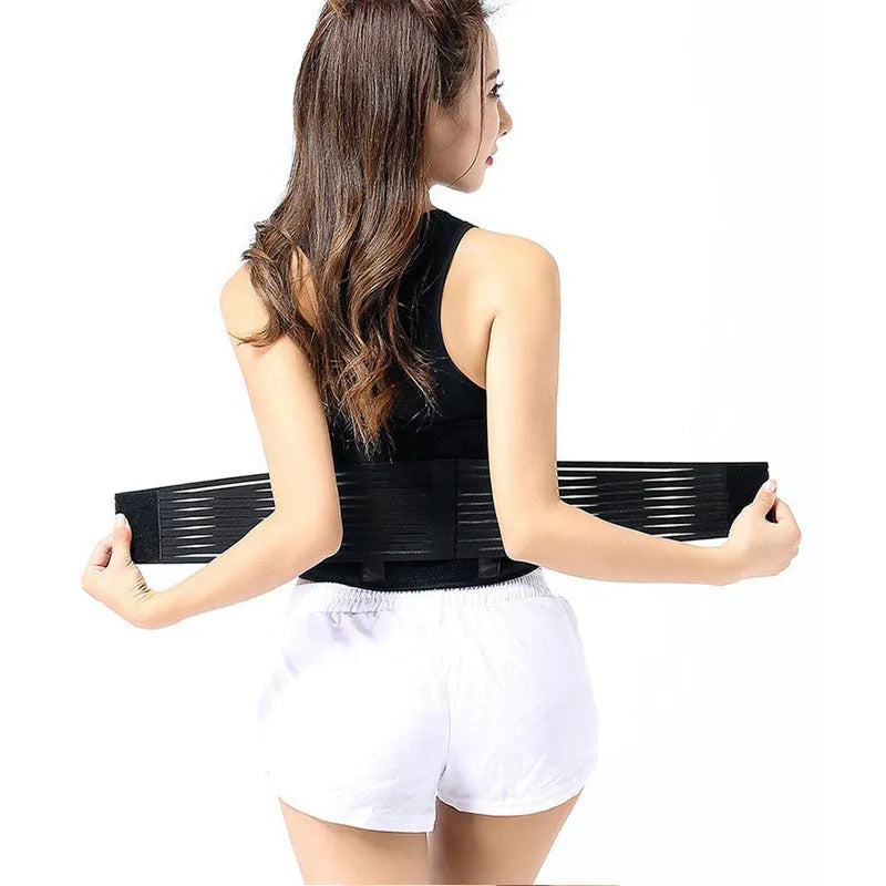 Black self-heating magnetic waist support belt laid flat, showing elastic cloth material and adjustable fit.
