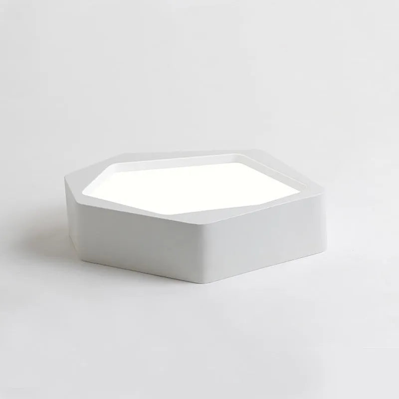 Geometric shaped wall light with black or white iron frame and push-button control.