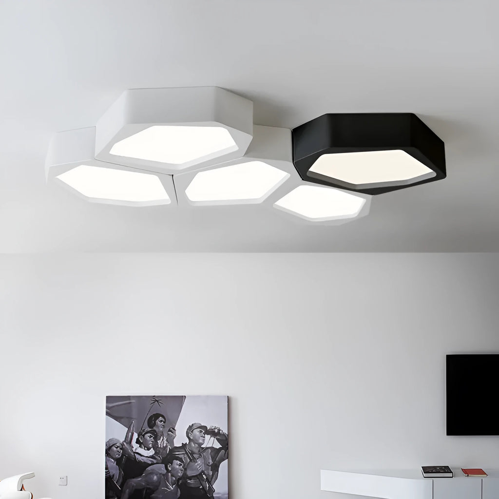 Geometric shaped wall light with black or white iron frame and push-button control.