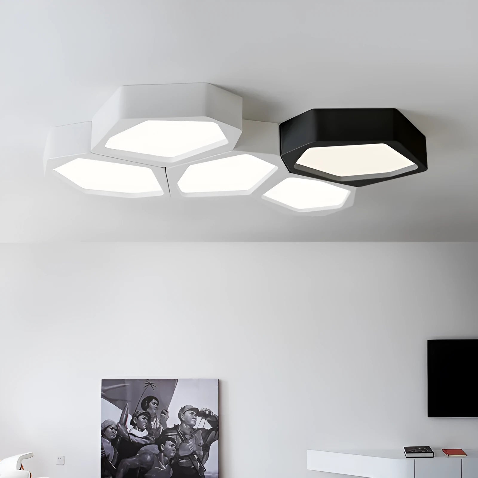 Geometric shaped wall light with black or white iron frame and push-button control.