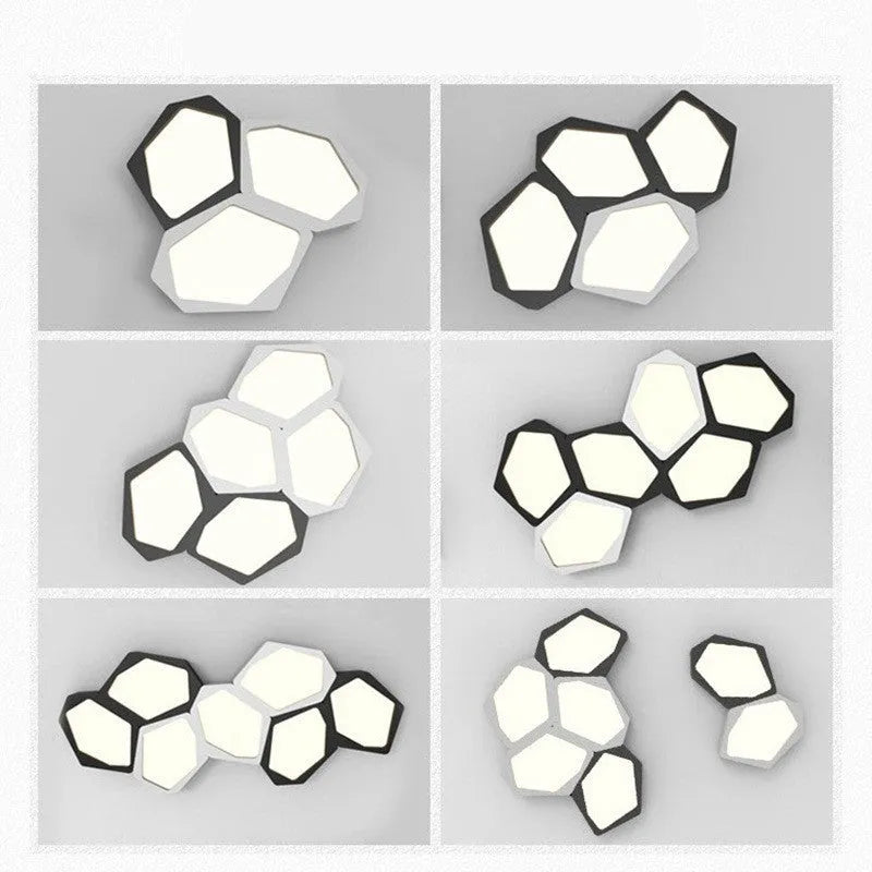 Geometric shaped wall light with black or white iron frame and push-button control.