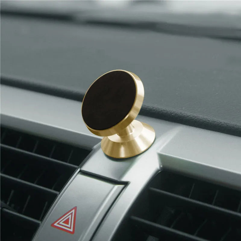 Universal magnetic car phone holder in black measuring 35.5mm by 40mm