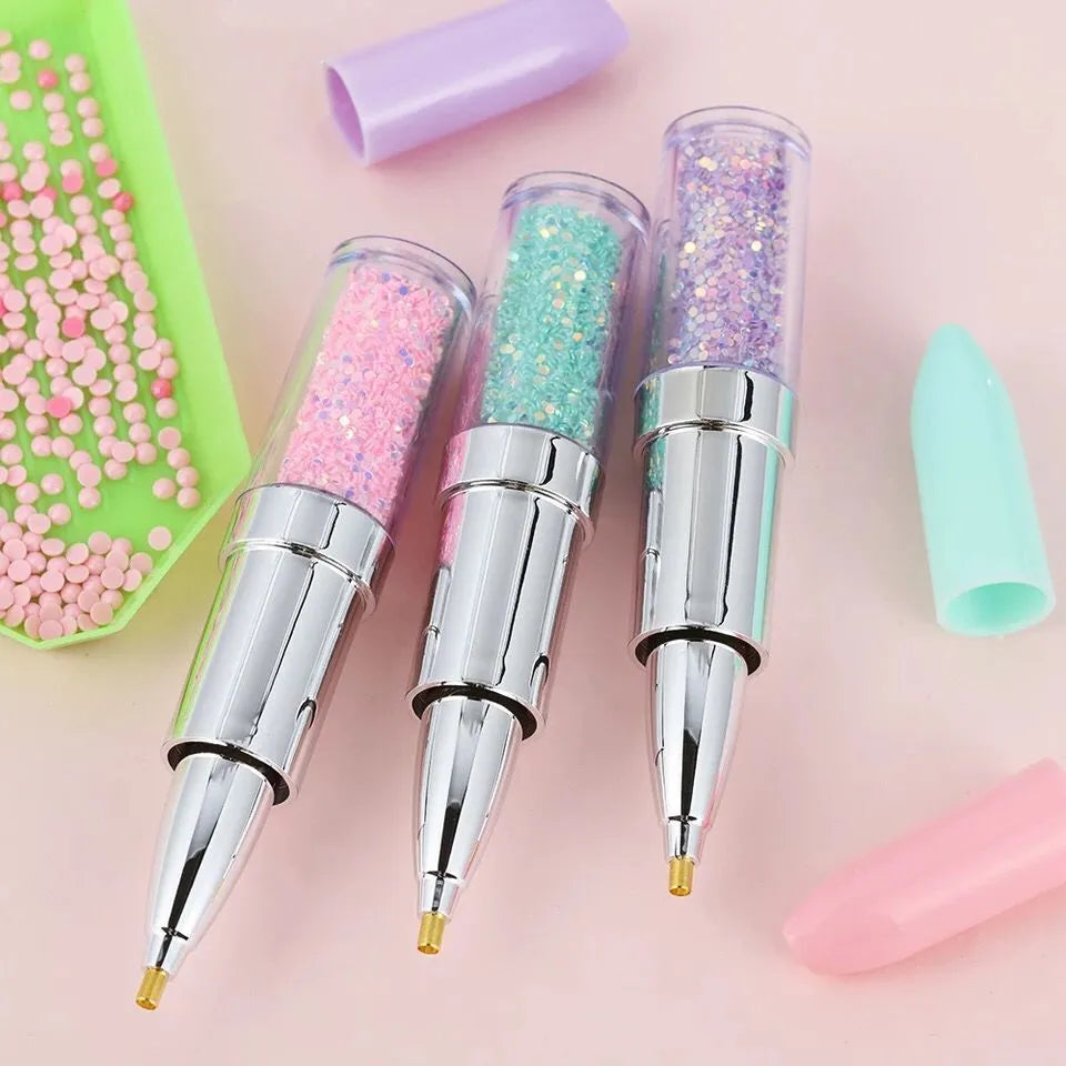 Plastic diamond painting drill pen tool in pink, purple, and green colours for 5D diamond art