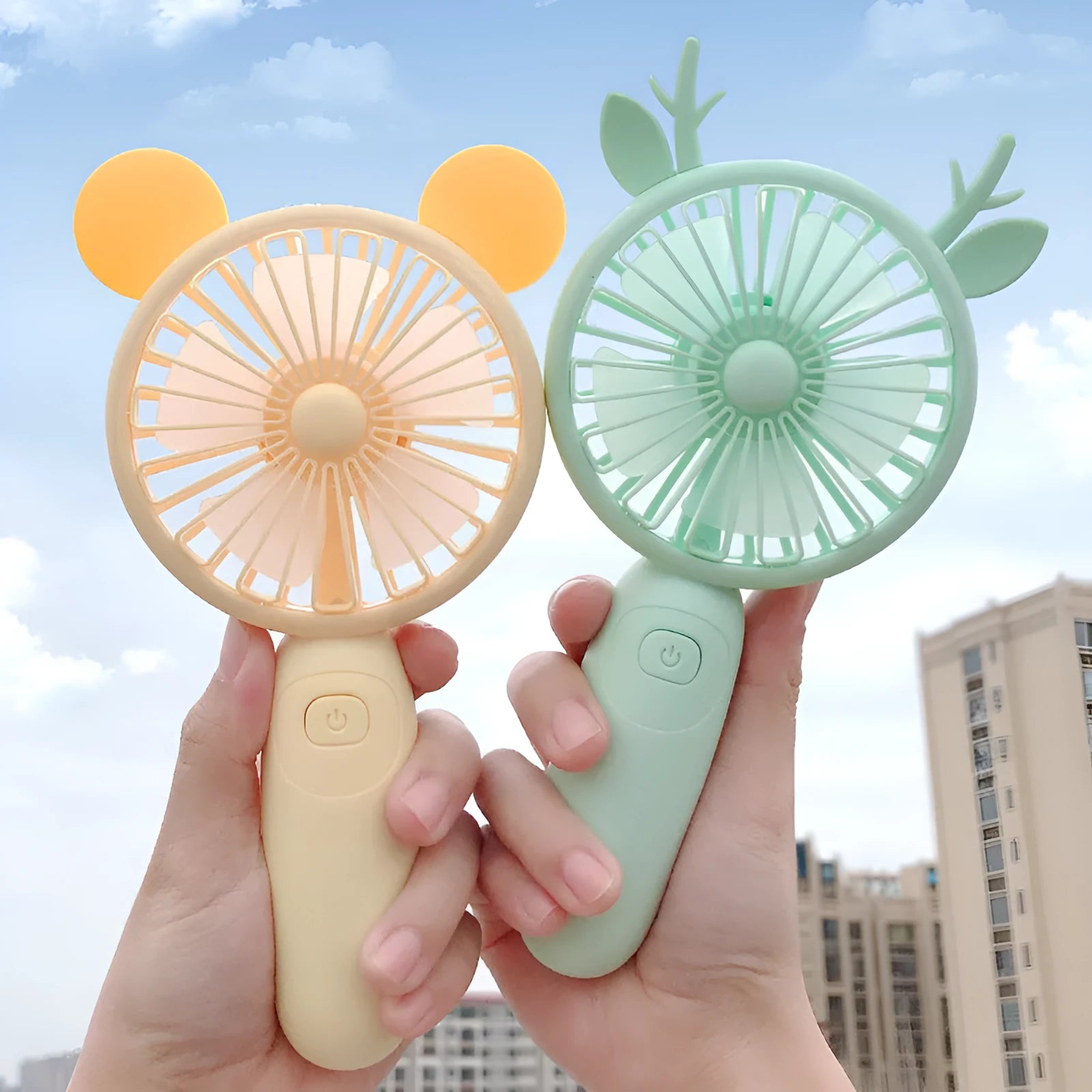 Small handheld USB rechargeable fan in blue, green, pink, or yellow colour options.