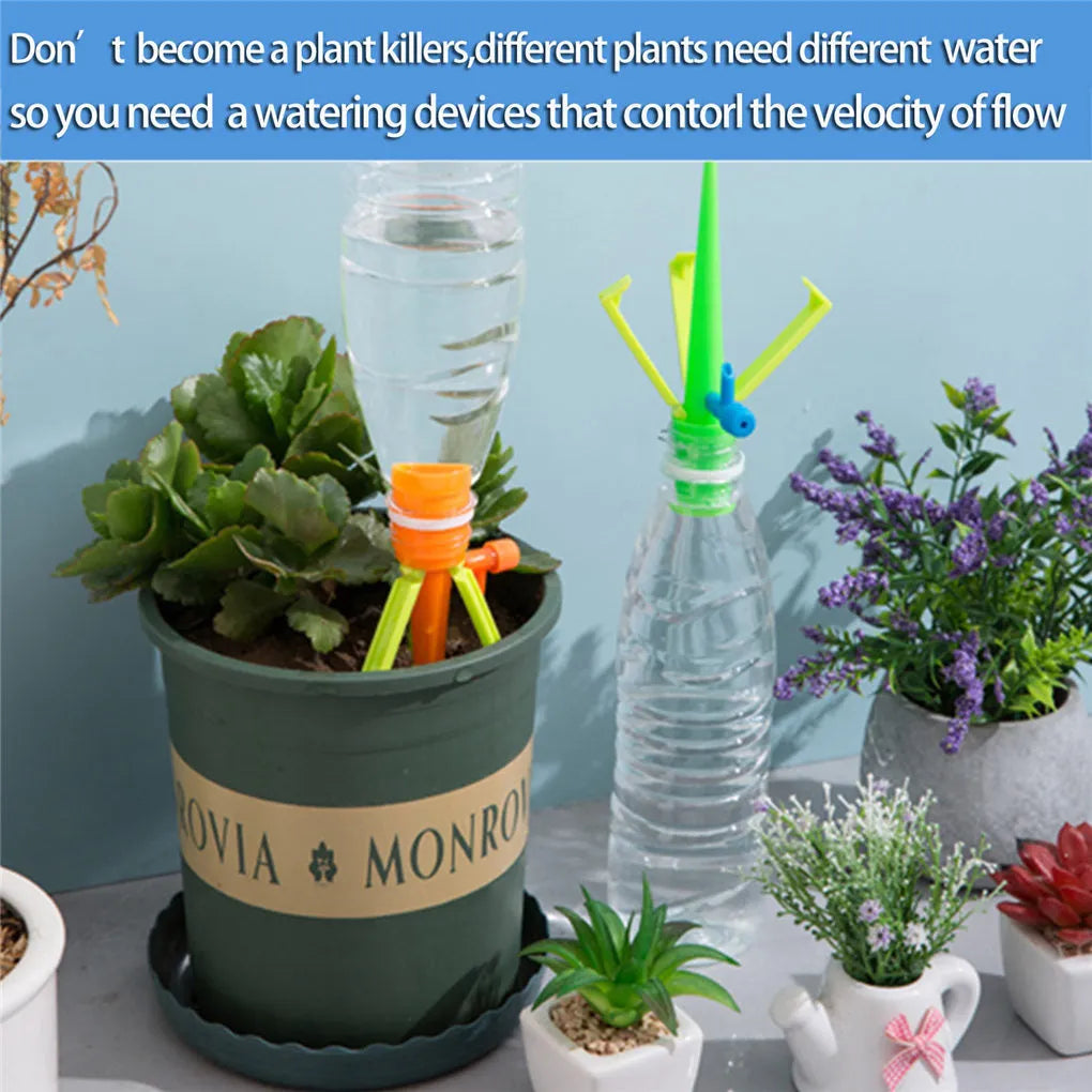 Plastic plant watering spikes 16.5cm x 3cm in green and orange for garden and potted plants