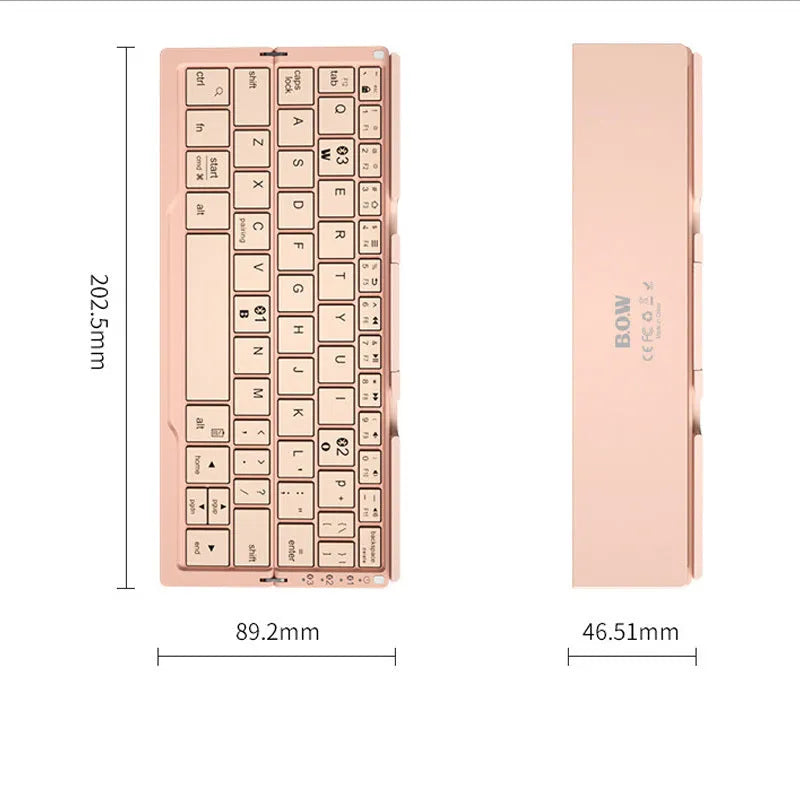 Silver aluminium foldable Bluetooth keyboard with stand holding smartphone