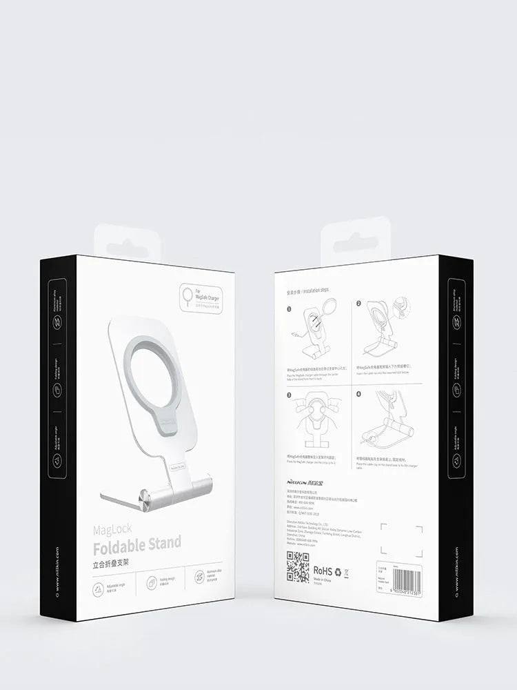 Silver NILLKIN foldable aluminium alloy magnetic wireless charging stand for iPhone 12 Mini on a desk