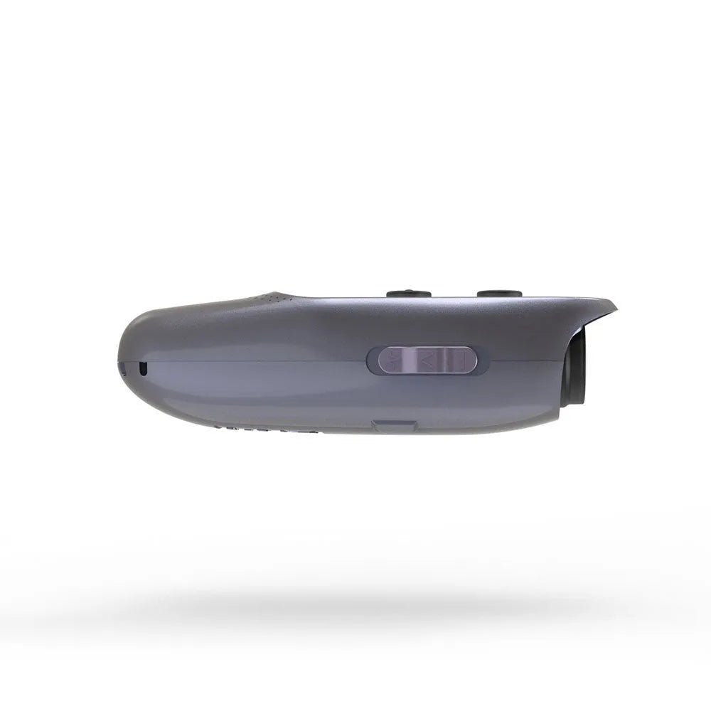 Black ultrasonic handheld dog trainer with 3 frequency modes and 10m range, on outdoor background