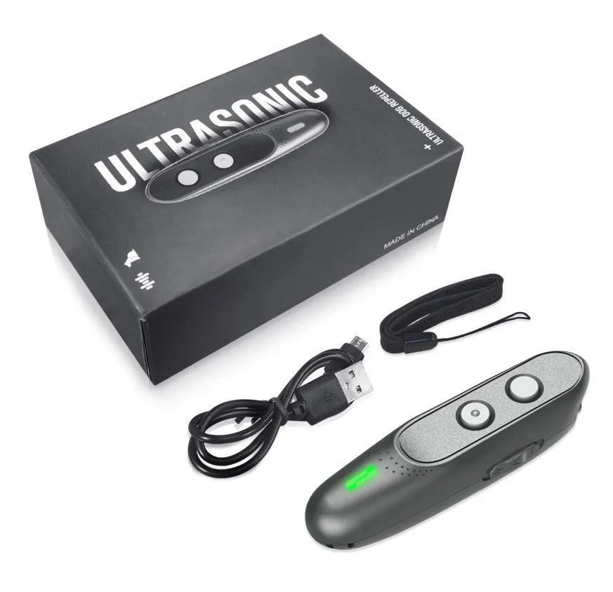 Black ultrasonic handheld dog trainer with 3 frequency modes and 10m range, on outdoor background