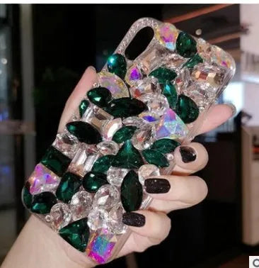 Clear rhinestone iPhone case showing decorative crystal pattern on TPU phone cover