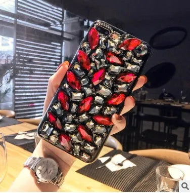 Clear rhinestone iPhone case showing decorative crystal pattern on TPU phone cover