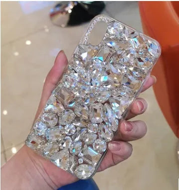 Clear rhinestone iPhone case showing decorative crystal pattern on TPU phone cover