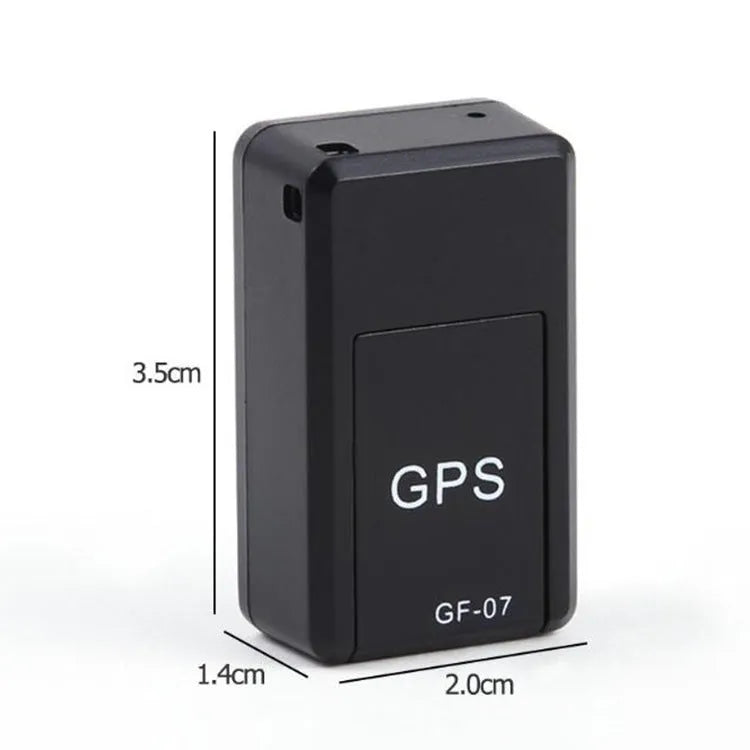 Small black magnetic GPS tracker device next to a USB charging cable.