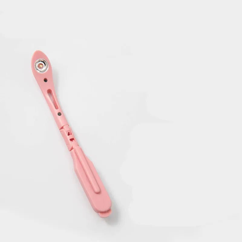 Folding book night light showing multiple colour options including yellow, green, blue and pink variants.