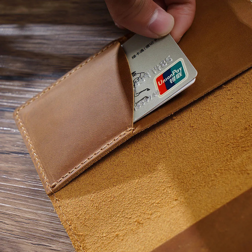 Leather travel notebook with Crazy Horse Yellow Brown cover, open to blank Daolin paper pages, A6 size 9x14cm