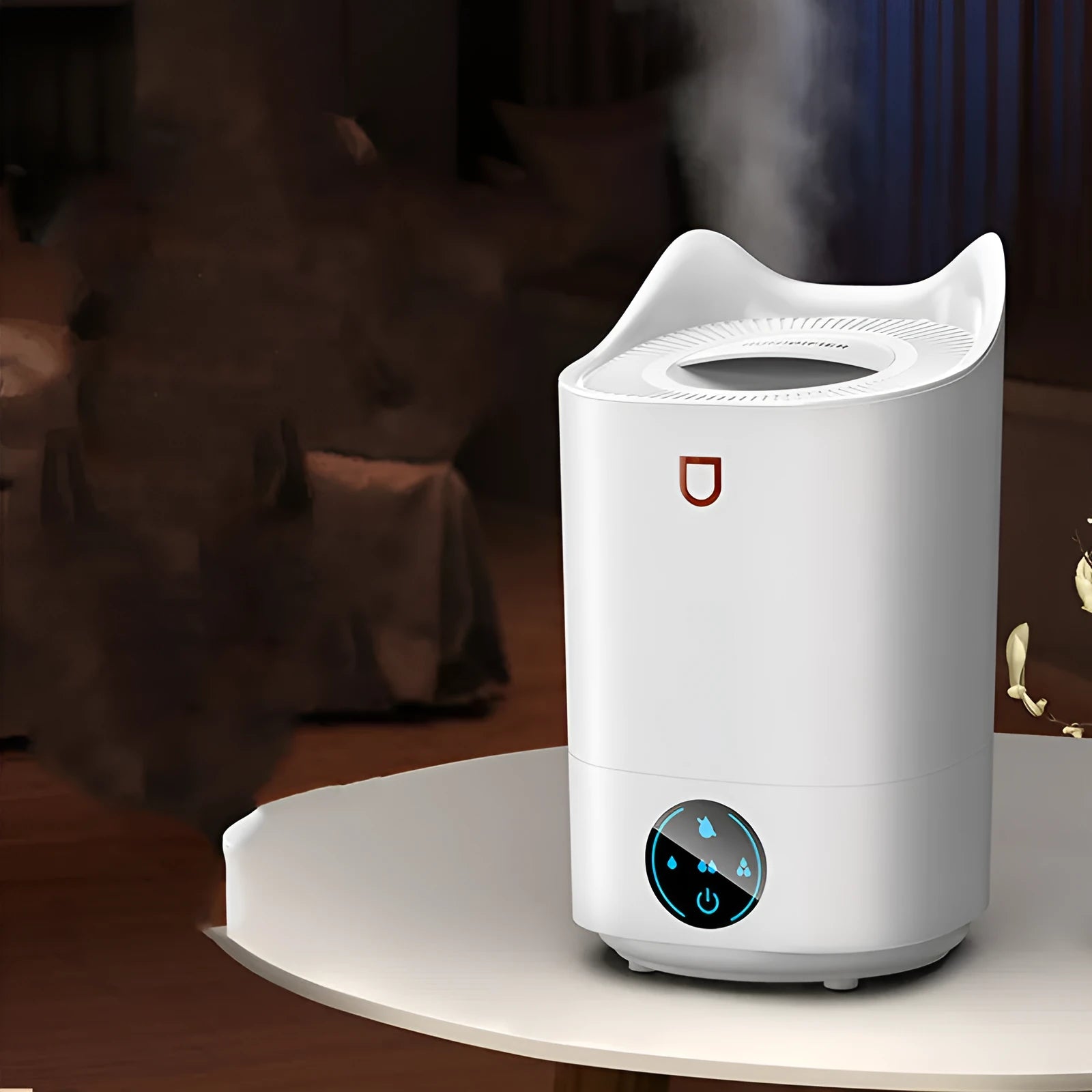 Coral pink double spray humidifier with large water tank and three mist outlets on a table.