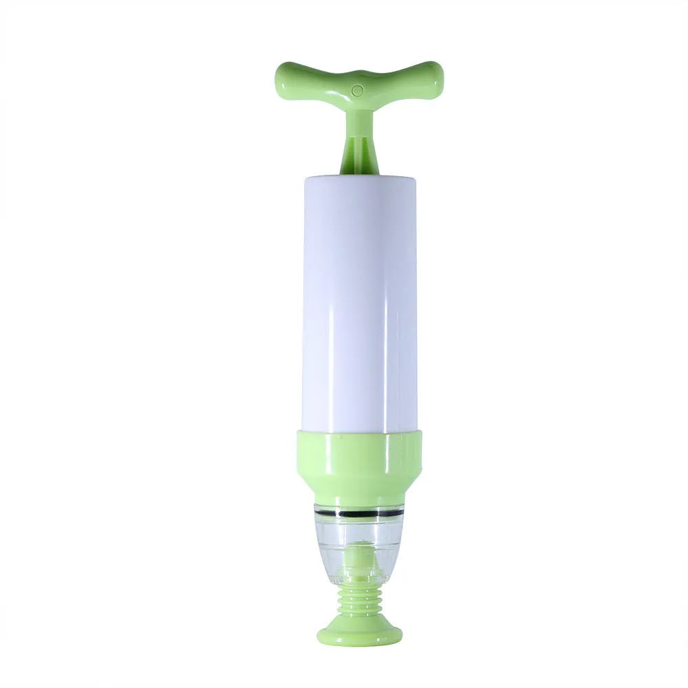 Green manual vacuum compression storage bag with hand pump on a grey background