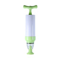 Green manual vacuum compression storage bag with hand pump on a grey background