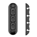 Black soft plastic desktop charging cable organiser on a wooden desk