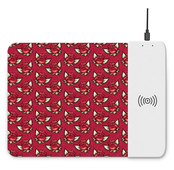 Wireless charging mouse pad with RGB lighting and cartoon design, showing cloth surface and rubber base