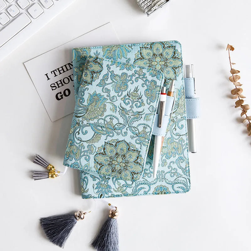 Fabric cover Flying Blue Flower series notebook in A5 and A6 sizes.