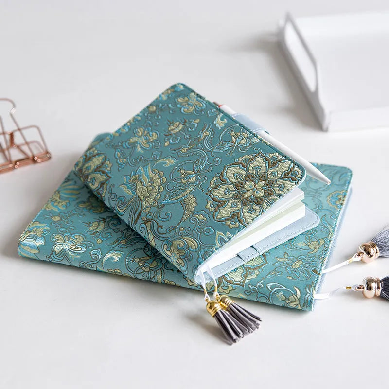 Fabric cover Flying Blue Flower series notebook in A5 and A6 sizes.