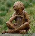 Brown natural resin boy figurine garden statue for tabletop decoration