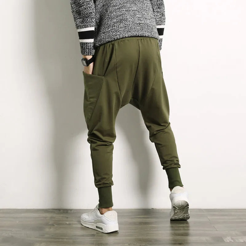 Japanese solid colour men's harem suspender pants in black, loose baggy fit with belt