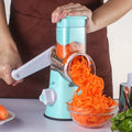 Blue vegetable chopper food processor with suction cup base and multi-function slicer grater design