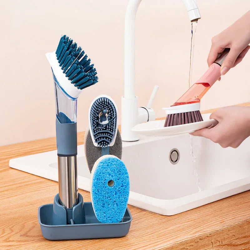 Long-handle kitchen cleaning brush with sponge head and built-in soap dispenser button in blue.