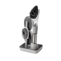 Long-handle kitchen cleaning brush with sponge head and built-in soap dispenser button in blue.