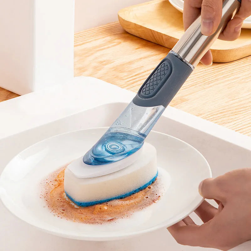 Long-handle kitchen cleaning brush with sponge head and built-in soap dispenser button in blue.