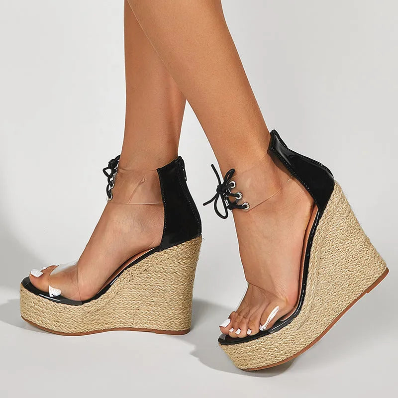 Black women's wedge sandals with hemp rope front tie and super high wedge heel.