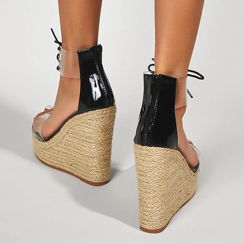 Black women's wedge sandals with hemp rope front tie and super high wedge heel.