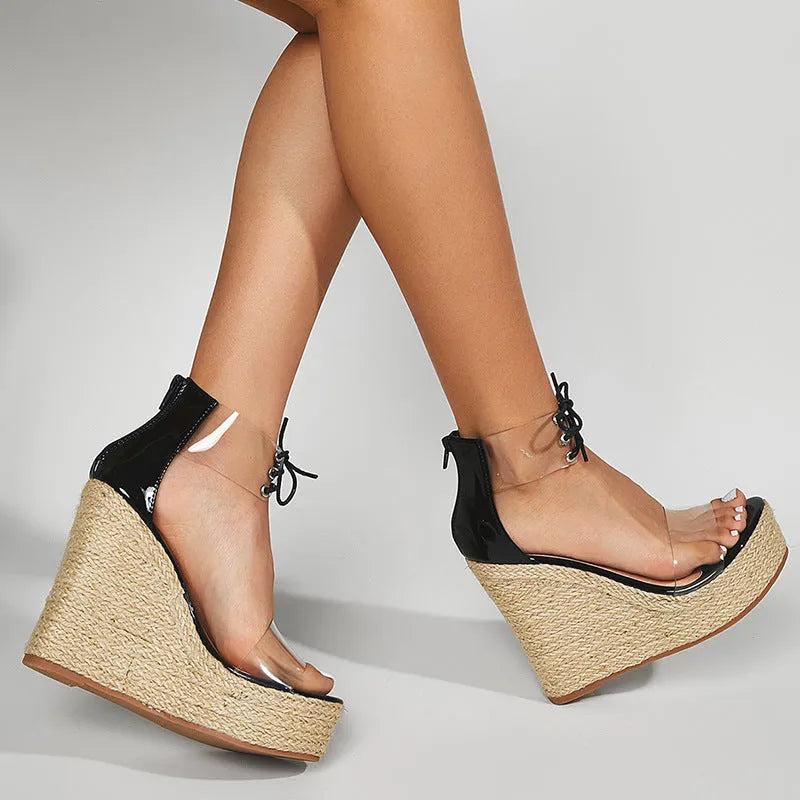 Black women's wedge sandals with hemp rope front tie and super high wedge heel.