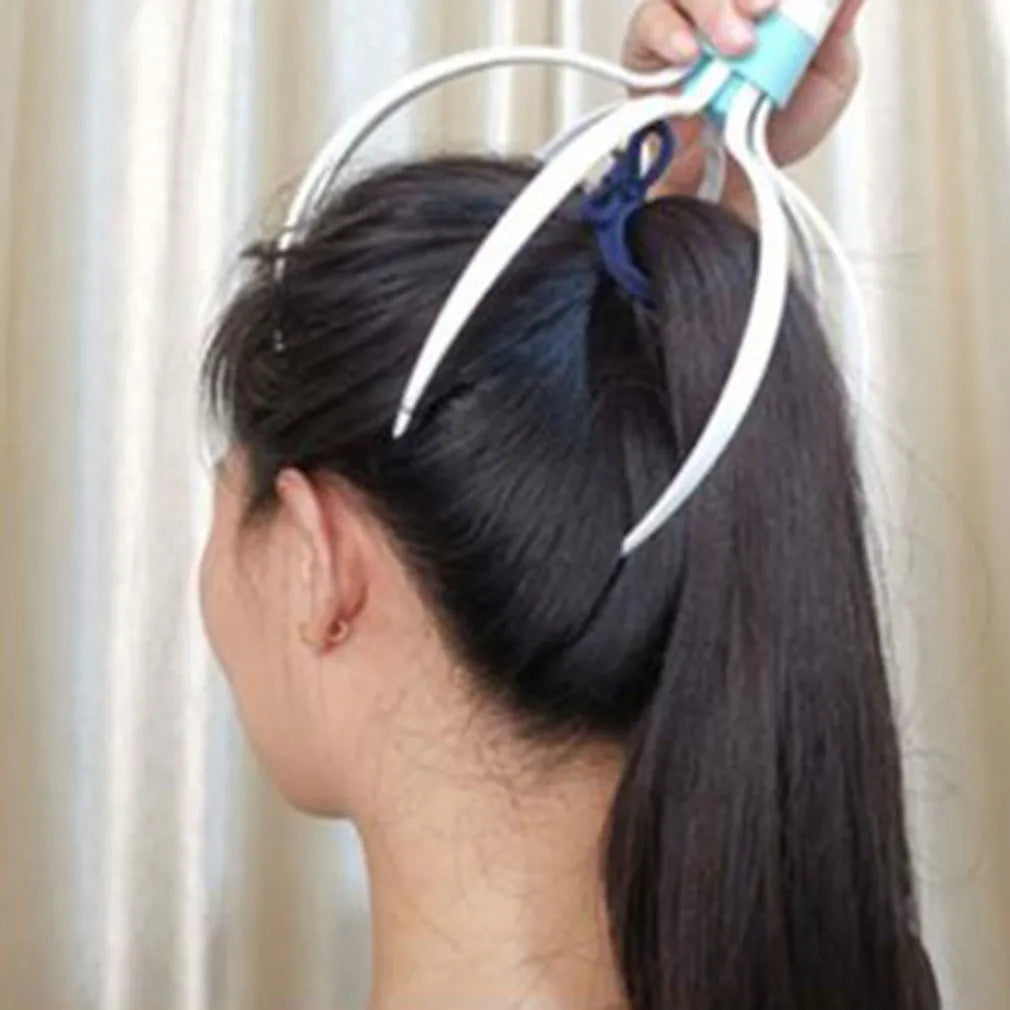 White electric head massager with eight removable vibration claws on a clean background