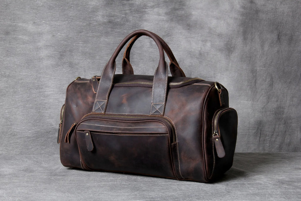 Genuine leather travel bag 20-35L capacity dark brown retro hand luggage with soft handle and shoulder strap