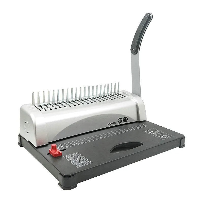 White A4 manual comb binding machine with 21-hole clamp strip punching mechanism on desk