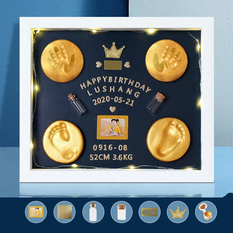 Modern cartoon-style baby hand and foot print anniversary frame in solid wood and MDF construction