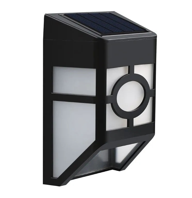 Compact white plastic solar wall light with solar panel and LED light lens.