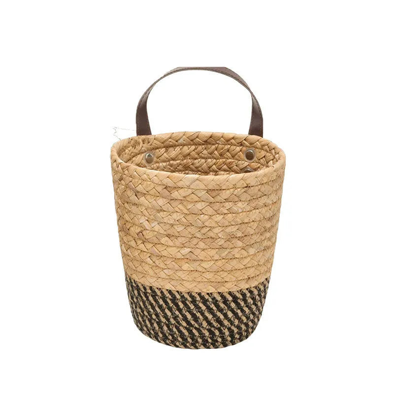 Handmade seaweed woven wall hanging basket in natural grass with two size options and multiple colours