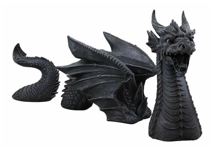 Large gothic dragon garden statue in charcoal grey resin with wings and tail, placed on a lawn